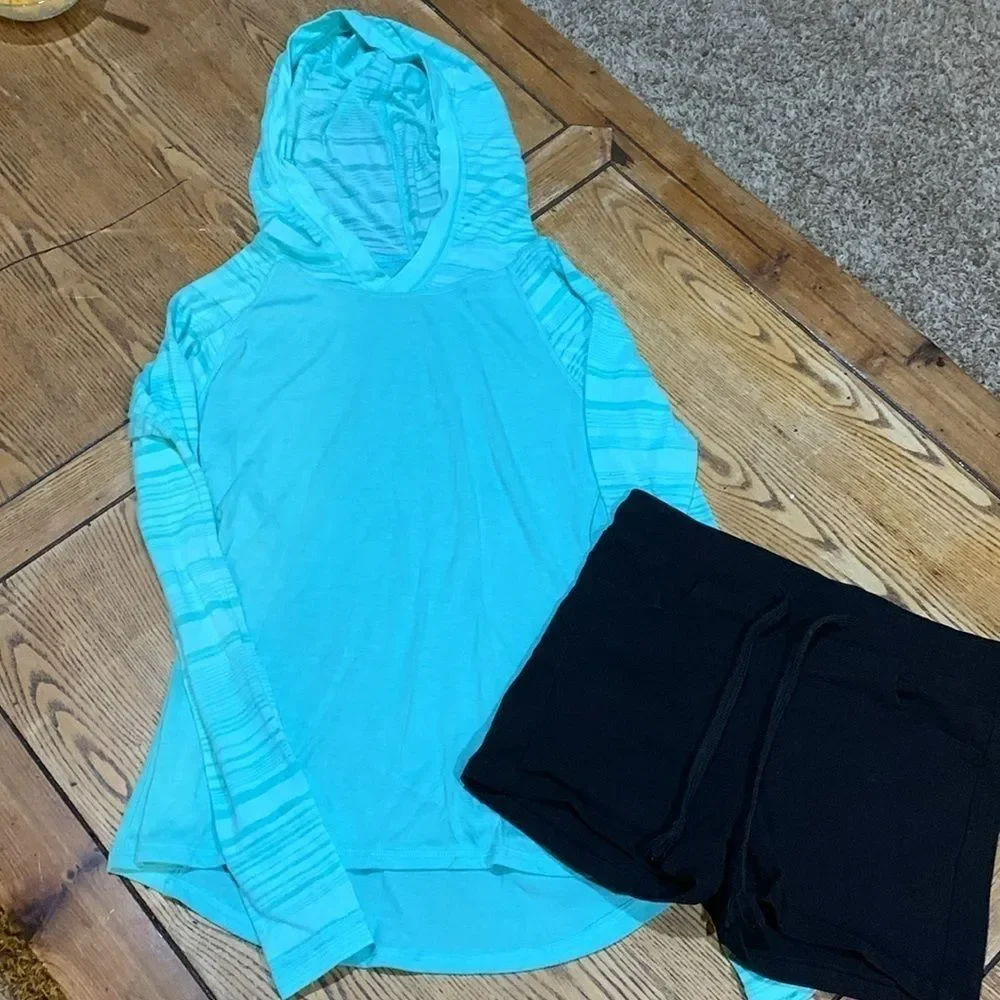 Girls small teal hooded shirt with black small stretchy shorts in box 11
